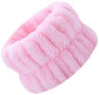 Two pairs of skincare wristbands for makeup routine display