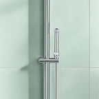 Side profile of the polished chrome shower enema attachment installed on a hose.