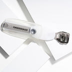 Tweezerman Safety Slide Callus Shaver being adjusted to reveal the shaving blade.