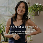LOLA body wipes for women being used for post-workout freshness.