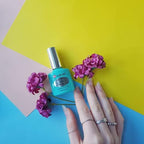 Clear nail strengthening treatment applying to fingernails