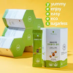 On-the-go individual 20 gram propolis jelly stick held to demonstrate portable size.