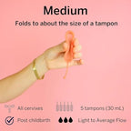 Side view of Pixie Menstrual Disc illustrating the unique oblong shape.
