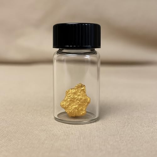 Zurjy gold paydirt and raw panning concentrate in studio lighting