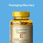 Two bottles of Puritan's Pride Vitamin E 10000 IU rapid release softgels showcasing clear product labeling.
