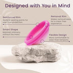 EcoBlossom hypoallergenic menstrual disc being folded for easy insertion.