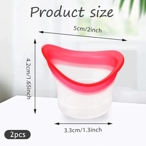 Pair of pink and transparent eye cleaning cups with storage case.
