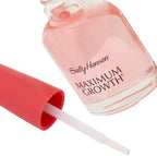 Sally Hansen Maximum Growth applied as a transparent shield for natural nail protection