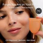 Ultra soft Lena period cup for sensitive bladders in coral color.