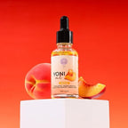 Close up of Magic V Yoni Oil packaging showing organic and herbal certifications