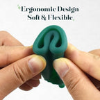 Medical grade silicone menstrual cup being held to show soft flexible material.