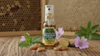 Close up of the non alcoholic propolis and ginger throat spray highlighting natural ingredients.