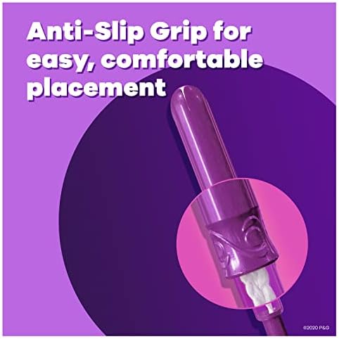 Pocket sized compact tampon applicator being extended for use.