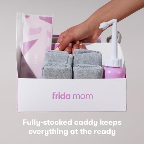 Frida Mom postpartum essentials kit unboxed showing all eight pieces clearly