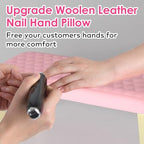 Close up of microfiber leather texture on pink nail cushion.