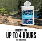 An adult applying a gentle plant oil insect wipe to protect skin during outdoor activities.
