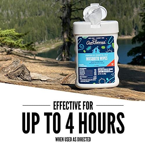An adult applying a gentle plant oil insect wipe to protect skin during outdoor activities.