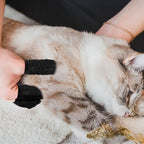 Close up of a person wearing a black LUSTRIB finger cot for precise work
