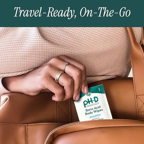 pH-D Boric Acid wipes being pulled from the travel-friendly pouch.