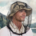 Cinvo mosquito head net worn over a hat, front view showing mesh coverage.