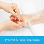 Applying Bodipure keratin socks for a professional salon style foot treatment.