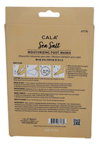 Person wearing Cala moisturizing socks for a ten minute home pedicure session.