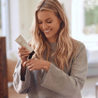 AHAVA hand cream application on skin demonstrating soothing Allantoin benefits