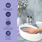 Conair True Glow Paraffin Spa being used for a deep moisturizing hand treatment