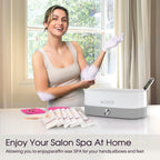 Peeling away a layer of cooled paraffin wax from treated hands to reveal deeply hydrated soft skin.