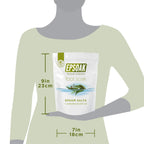 Lifestyle shot of the Epsoak Epsom salt bag placed next to a warm water foot basin.