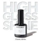 Modelones gel polish bottle next to UV LED nail lamp