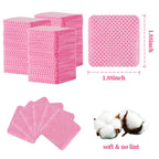 Pink non woven fabric nail polish remover pads spread out to show texture