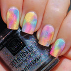 INM fast drying holographic top coat showcasing the brush applicator and smooth fluid texture