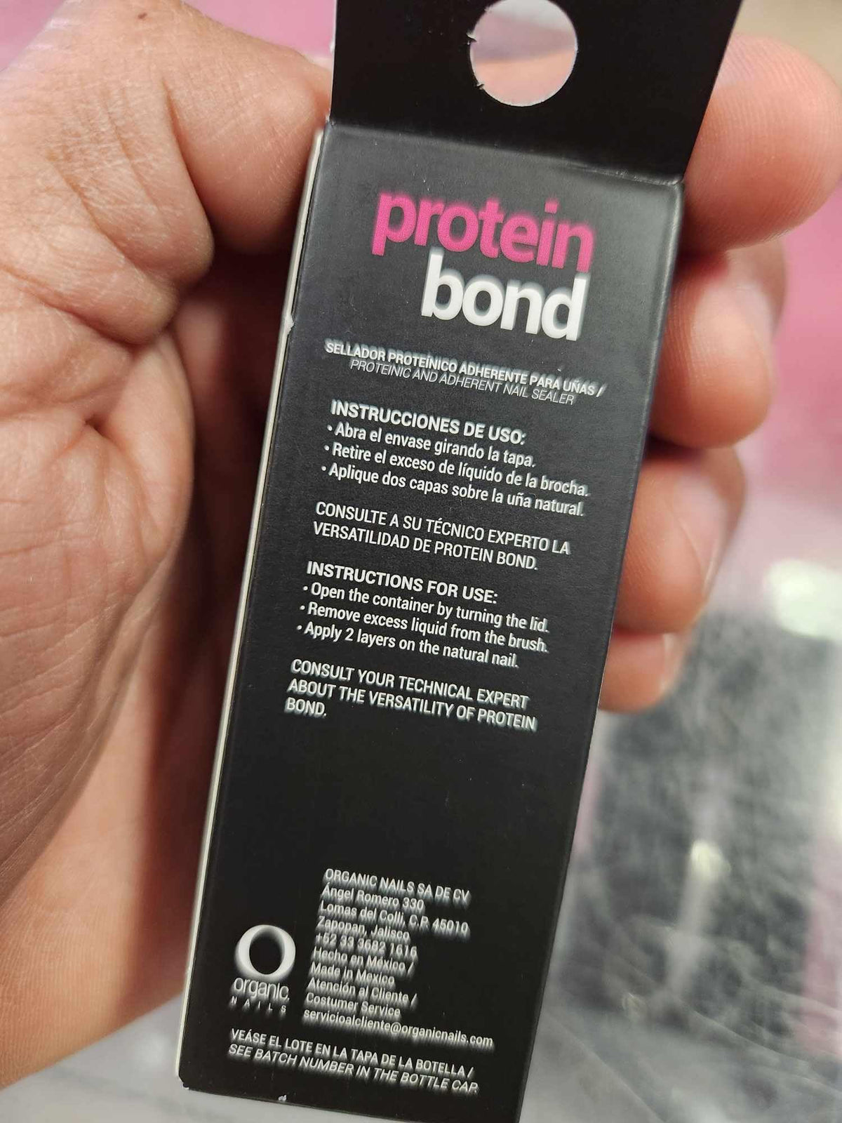 Organic Nails protein sealant showing the convenient applicator brush and bottle design