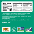PB2 Performance 2 pound jar alongside fresh peanuts and cocoa beans