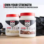 Vanilla Crème flavored Muscle Milk protein powder next to a gym shaker bottle