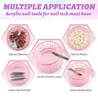 Pink glass dappen dish next to acrylic nail brush for scale