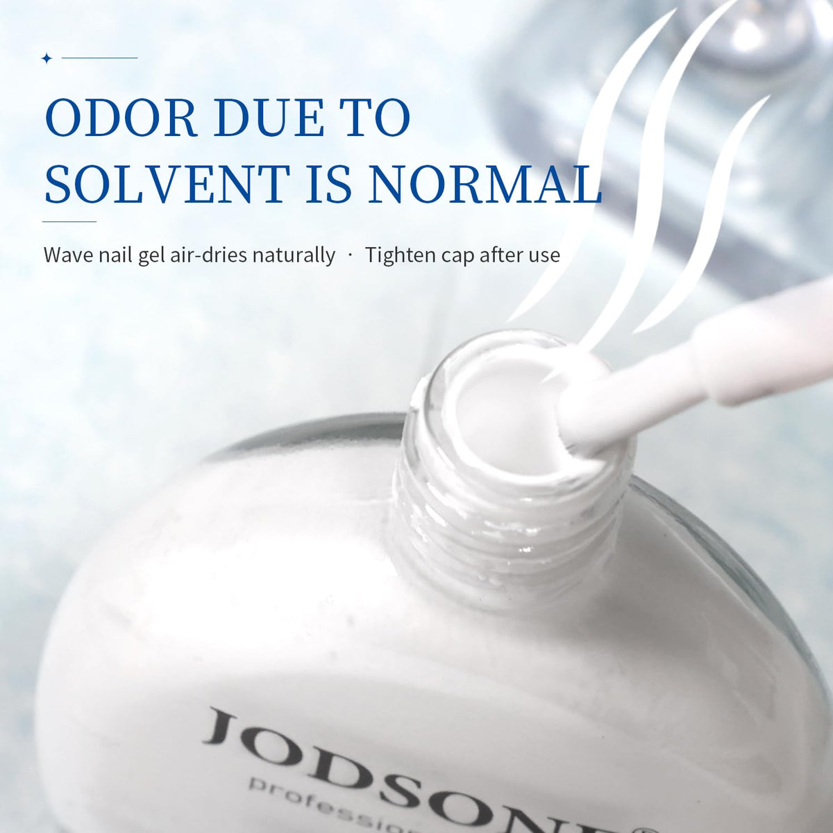 High fluidity white blooming gel polish being applied with a brush onto an uncured nail layer