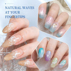 Nail artist curing the completed white wave liquid manicure design under a professional LED lamp