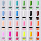 Close up of vibrant colored acrylic nail powder jars