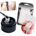 Transparent nail clip holding fiber extension in place under LED lamp
