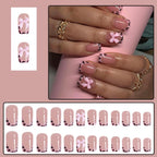 Close up of 3D pink bow detail on leopard print press on nails