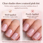 Close up of CurvLife square sheer pink fake nails on hand