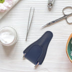 Assorted color embroidery scissor protectors laid out to show fine craftsmanship and stitching.