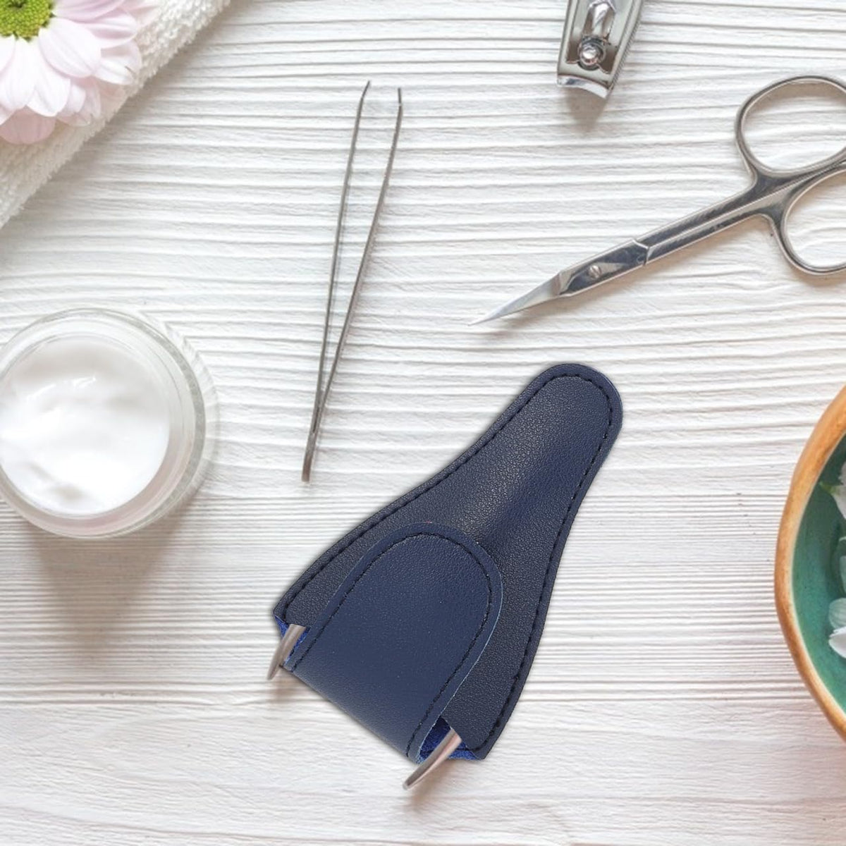 Assorted color embroidery scissor protectors laid out to show fine craftsmanship and stitching.