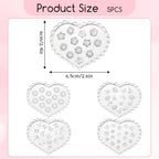Professional manicure showing 3D floral nail charms