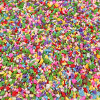 Close up of 13-mixed colorful irregular polymer clay slices