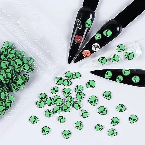 Creative DIY nail art design featuring green alien polymer slices