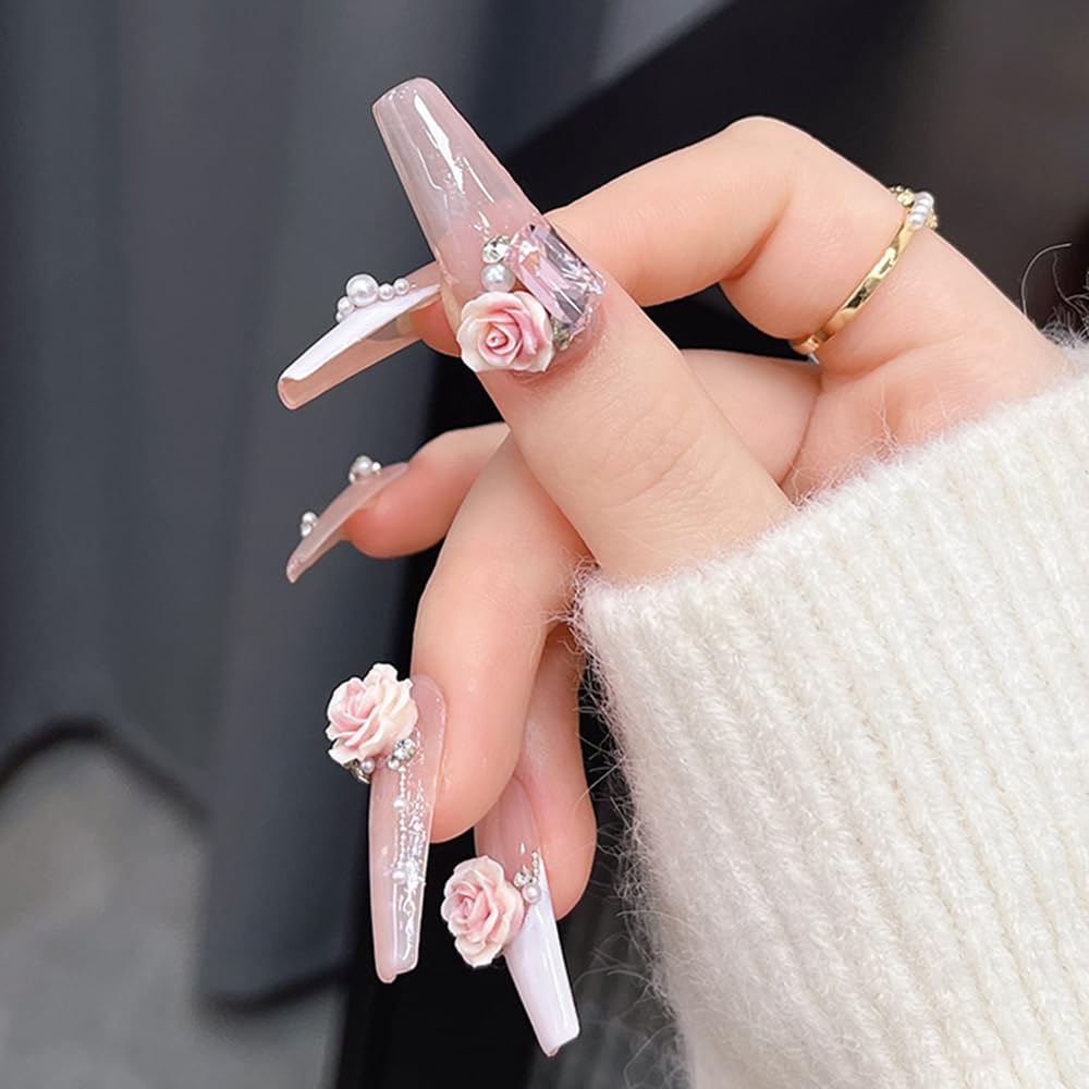 Finished 3D flower nail charms made with Jaliya molds