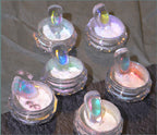 Model wearing nails with mirror-like chrome aurora effect